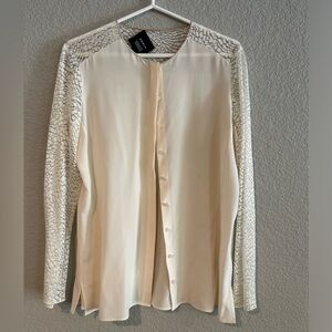 Akris cream silk blouse with lace sleeves